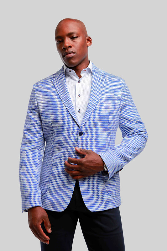 Get ready for the summer season with this striking blue houndstooth blazer. The Cape Cod blazer is crafted in our deconstructed model, allowing for a more relaxed feel and a greater sense of casual elegance.