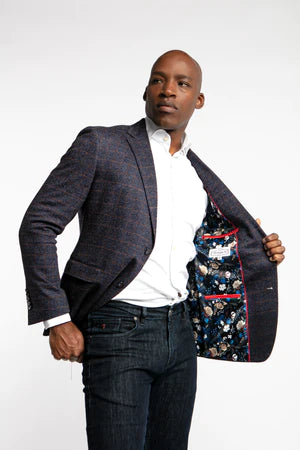 Constructed with modern fits and fabrics, we make traditional sport coat patterns like the Axl sport coat suitable for everybody. This sport coat is made using a wool, polyester, and cotton jersey fabrication, giving you the ability to be fashionable without sacrificing comfort.