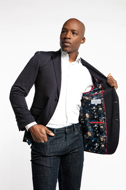 Meet Charlie; the garment where fashion meets function like no other coat in your closet. This navy blazer is super stretchy and lightweight, making it your perfect travel companion, while also elevating your everyday basic blue sport coat. Like most 7 Downie St. sport coats, the Charlie has a generous amount of stretch, allowing you to look your best without compromising comfort.