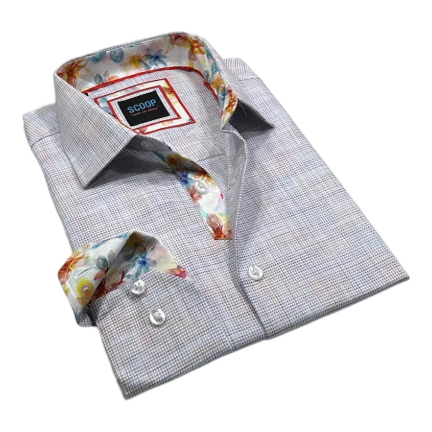 Folded shirt with floral cuffs and collar on a white background