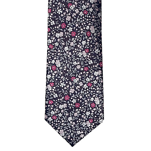 Floral patterned tie on a white background