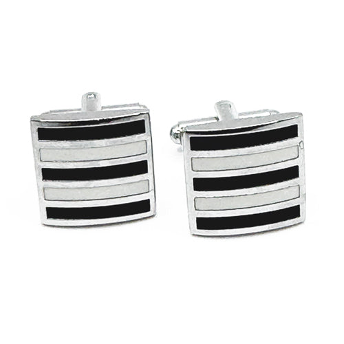 Pair of black and silver striped cufflinks on a white background