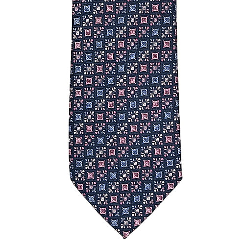 A classic necktie with a detailed geometric and floral pattern in navy blue, pink, and white, shown flat against a plain white background.