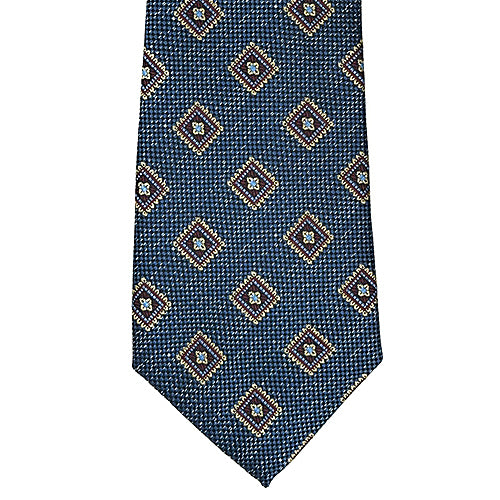 Navy blue tie with gold geometric pattern on a white background