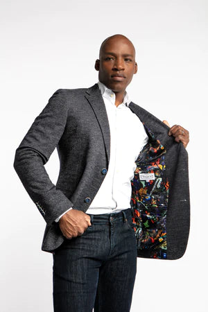 Constructed with modern fits and fabrics, we make traditional sport coat patterns like the Dante sport coat suitable for everybody. This sport coat is made using a wool, polyester, and cotton jersey fabrication, giving you the ability to be fashionable without sacrificing comfort.