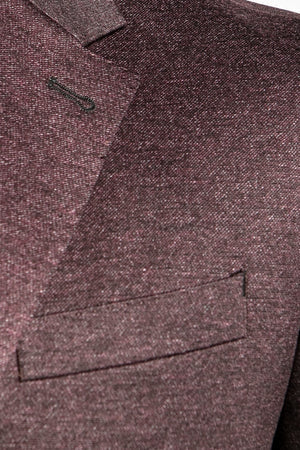 Our best selling sport coat of the season, the Higgins boasts the perfect shade of burgundy. Harmonized with black button threads and tonal buttons, this sport coat is well suited for office wear, as well as a more elevated casual look on a cool fall night. Like most 7 Downie St. sport coats, the Higgins has a generous amount of stretch, allowing you to look your best without compromising comfort.