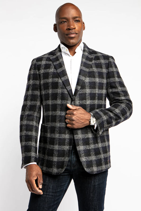 Constructed with modern fits and fabrics, we make traditional sport coat patterns like the Hunter sport coat suitable for everybody. This sport coat is made using a wool and polyester jersey fabrication, giving you the ability to be fashionable without sacrificing comfort.