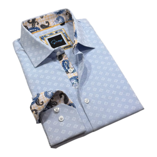 Folded light blue dress shirt with patterned collar and cuffs on a white background