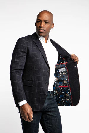 Constructed with modern fits and fabrics, we make traditional sport coat patterns like the Owens sport coat suitable for everybody. This sport coat is made using a wool, polyester, and cotton jersey fabrication, giving you the ability to be fashionable without sacrificing comfort.