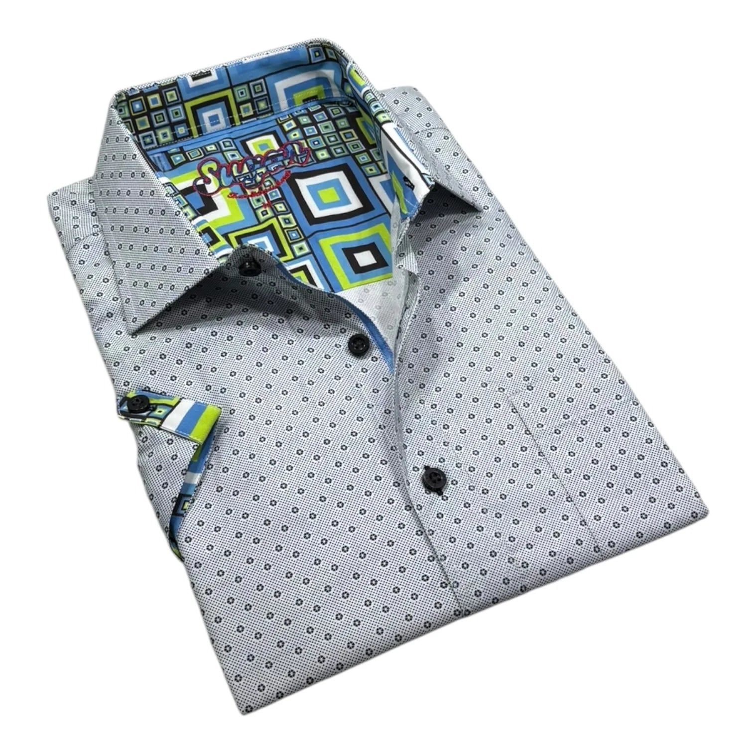 Folded dress shirt with geometric patterned collar and pocket square on a white background