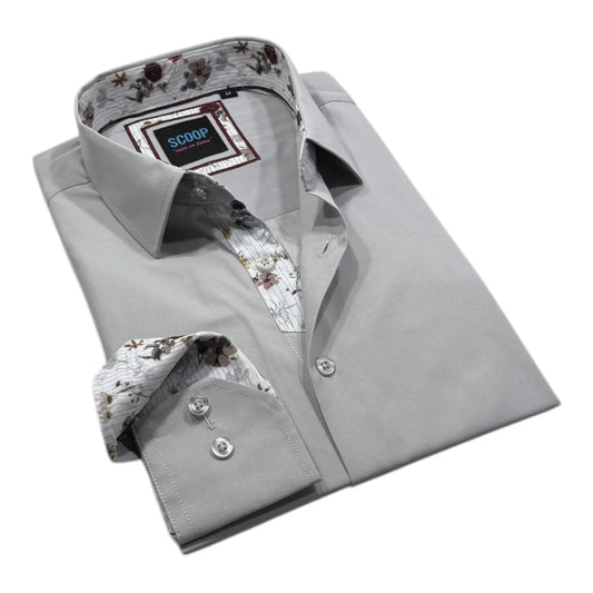 Folded gray dress shirt with floral inner lining on a white background