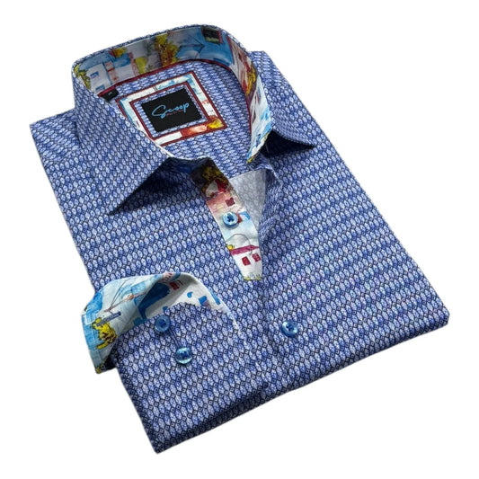 Folded blue patterned shirt with colorful collar and cuff on a white background