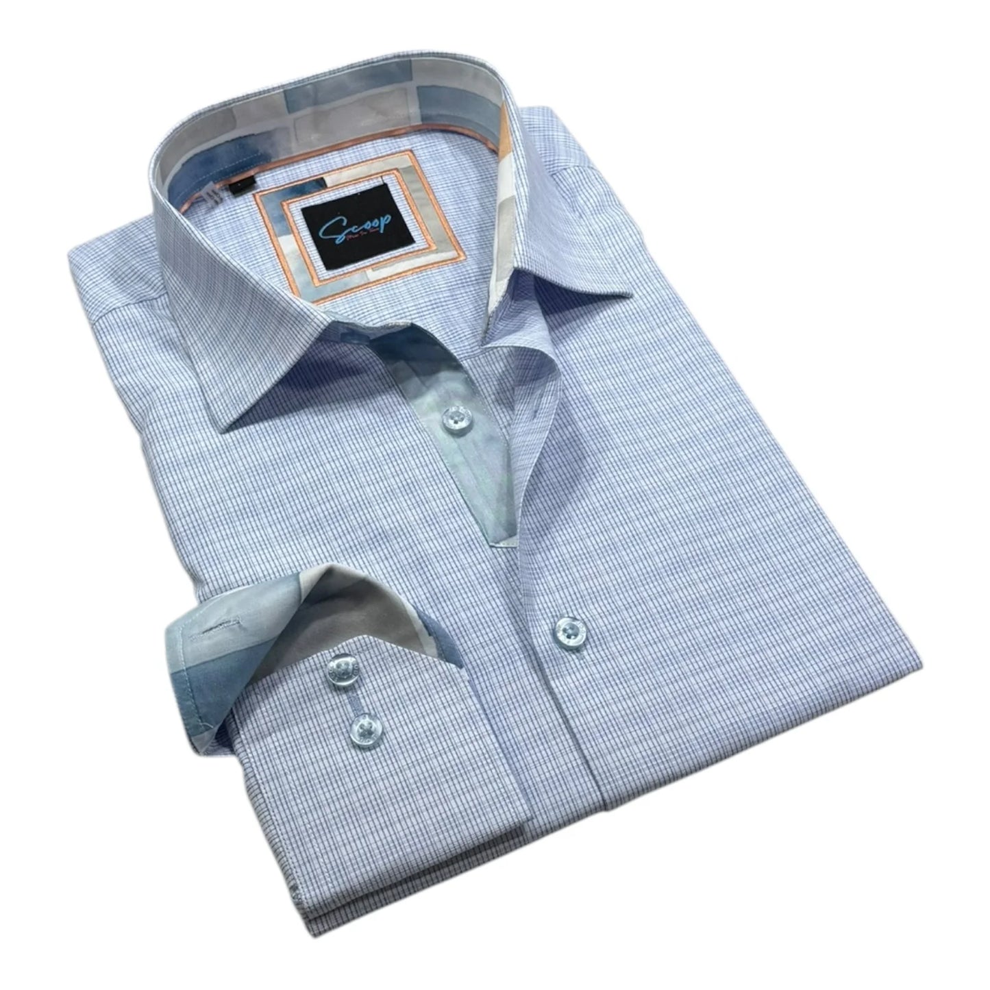 Folded light blue checkered dress shirt with a brand label on a white background