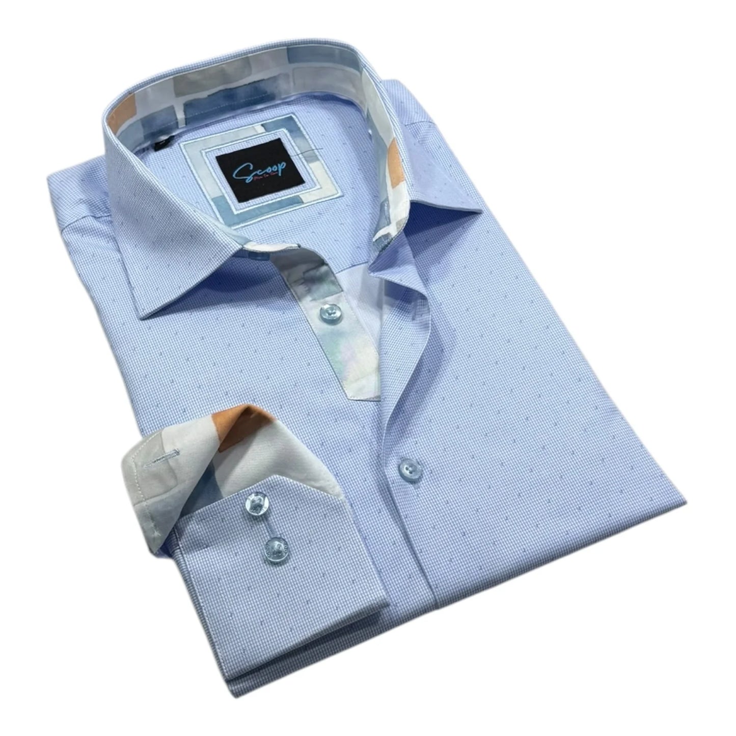 Folded light blue dress shirt with a brand label on a white background