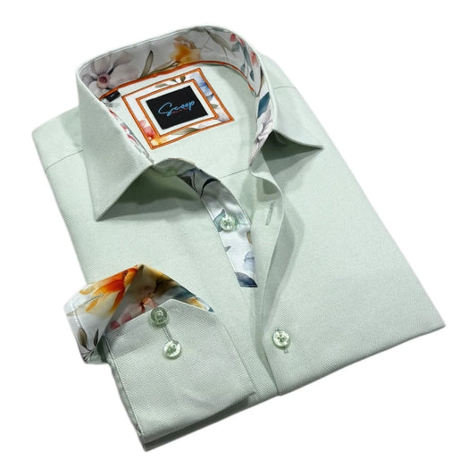 Light green dress shirt with floral cuffs and collar on a white background