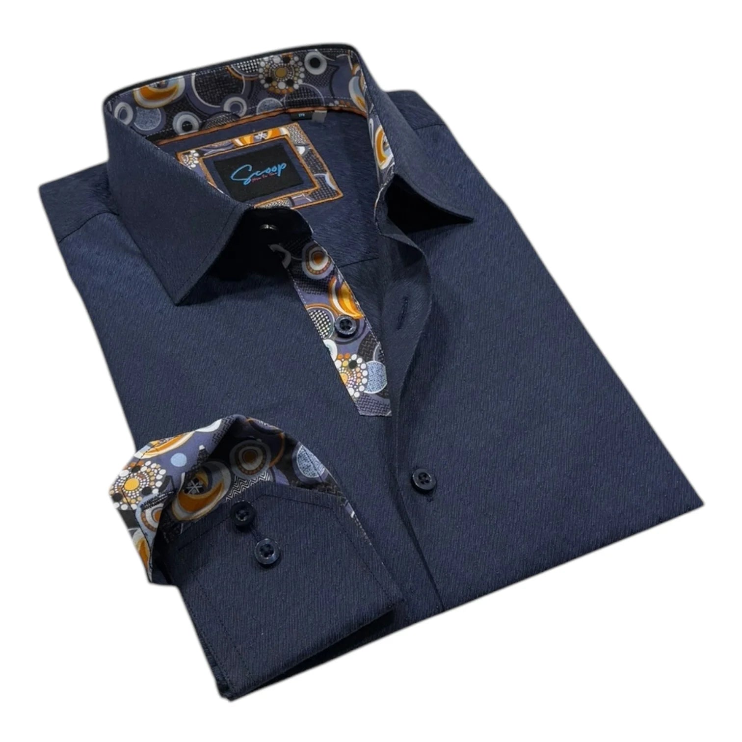 Folded navy blue shirt with patterned collar and cuffs on a white background
