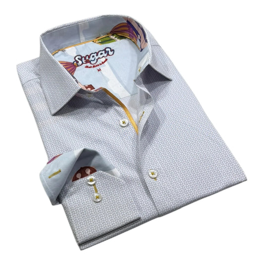 Folded dress shirt with patterned collar and cuff on a white background