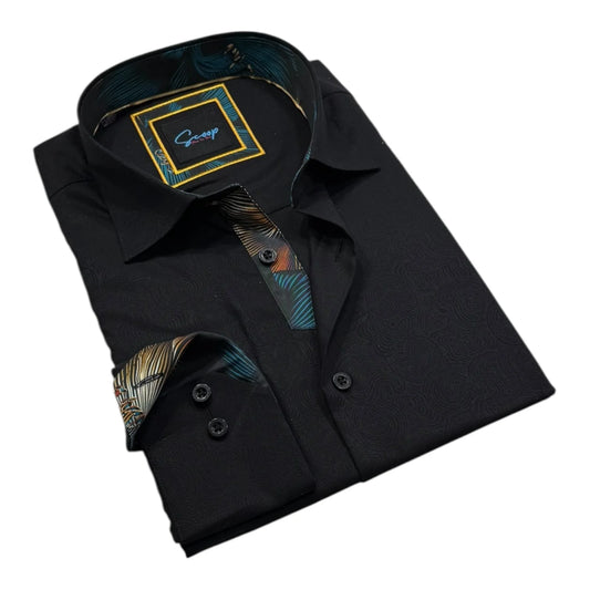 Folded black dress shirt with a colorful lining on a white background