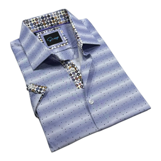 Folded blue dress shirt with patterned cufflinks on a white background