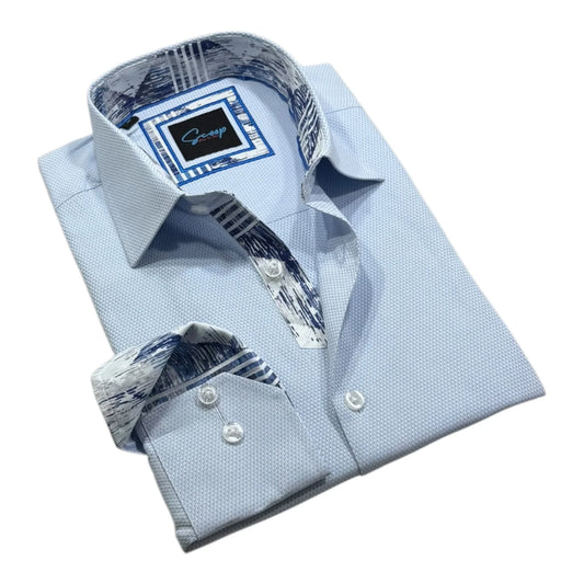 Light blue dress shirt with patterned tie on a white background