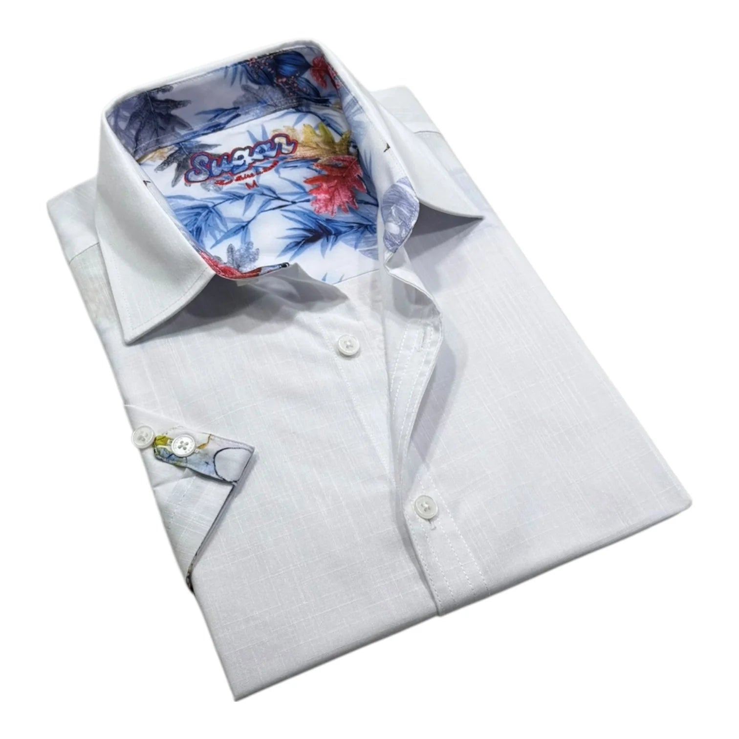 Folded white dress shirt with colorful floral inside collar on a white background