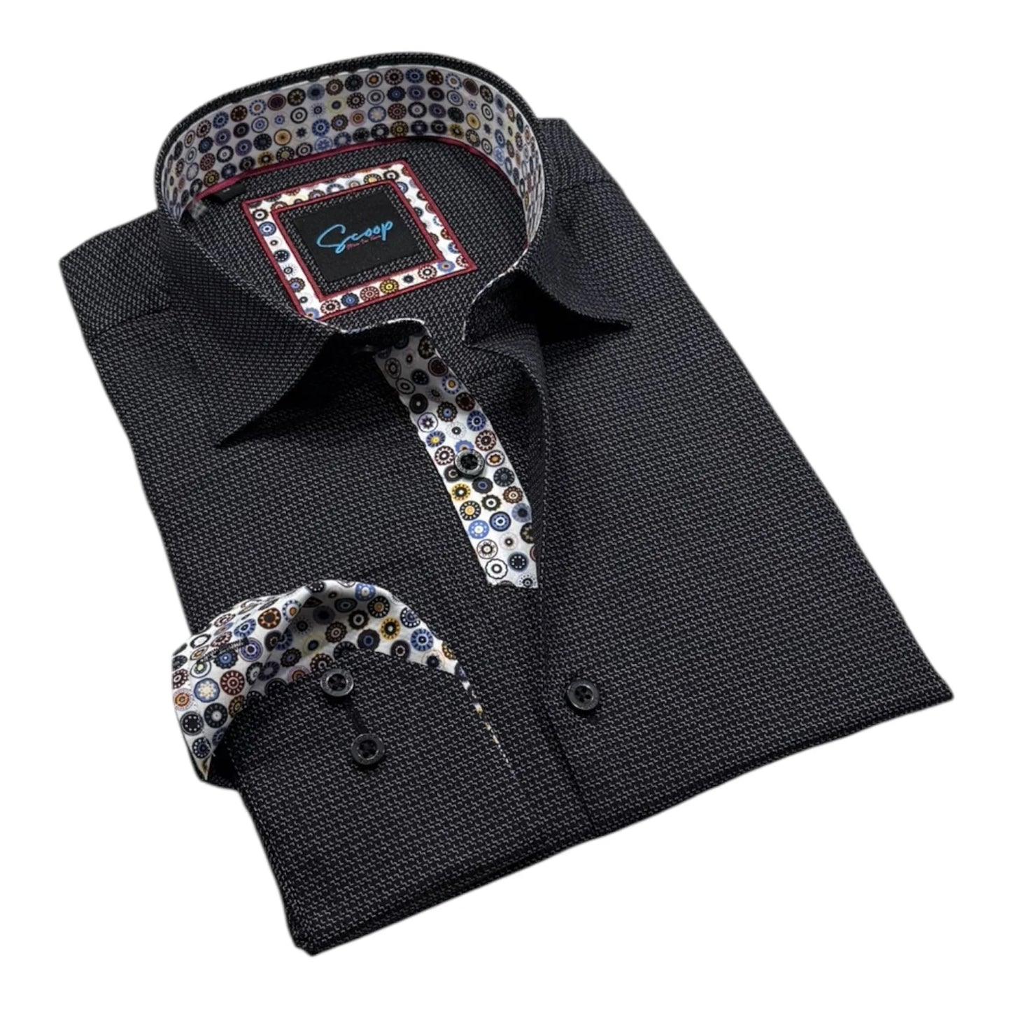 Black dress shirt with a patterned tie and pocket square on a white background