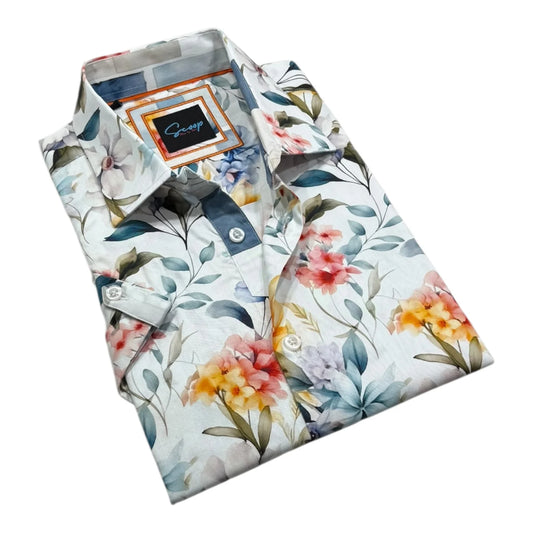 Folded floral-patterned shirt with a brand label on a white background