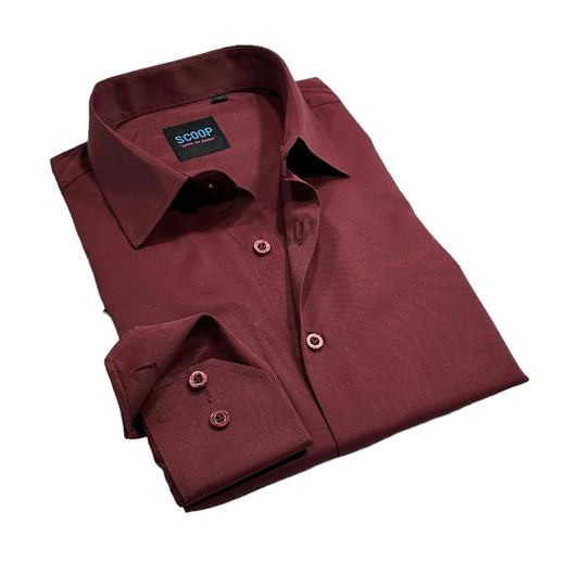 Folded maroon shirt with 'SCOOP' label on a white background