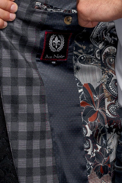 Close-up of a shirt with a brand label and patterned fabric