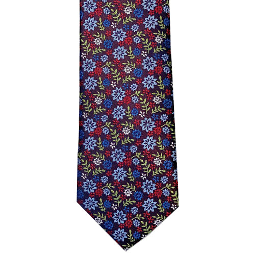 This fun, floral tie from Knotz is a great tie to add to your summer wardrobe. With blue, red, green and navy tones, it's easy to match this piece with any plain or subtly-patterned shirt and blazer combination.