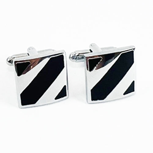 Nothing adds a more elegant touch to a man's wardrobe than a fine pair of black and silver cuff links. Whether it's for a wedding outfit, an important business meeting, or any formal setting, these Knotz cuff links are an essential men's accessory that will never go out of style. These black and silver cuff links are packaged in a gift box.
