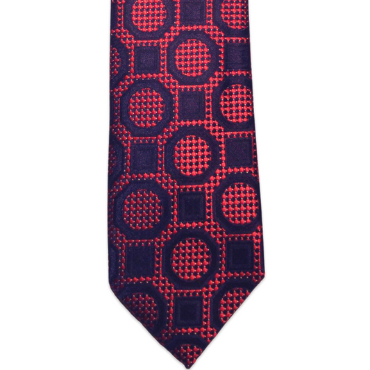 This Gian Marco Venturi red tie has a navy blue geometric pattern, making it a fun accent to a crisp Scoop white or blue dress shirt, a royal blue suit and black dress shoes.