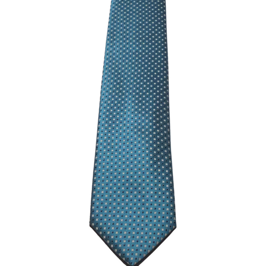 This Gian Marco Venturi teal tie is a beautiful summer accent to a crisp Scoop white or blue dress shirt, a royal blue suit and brown shoes.