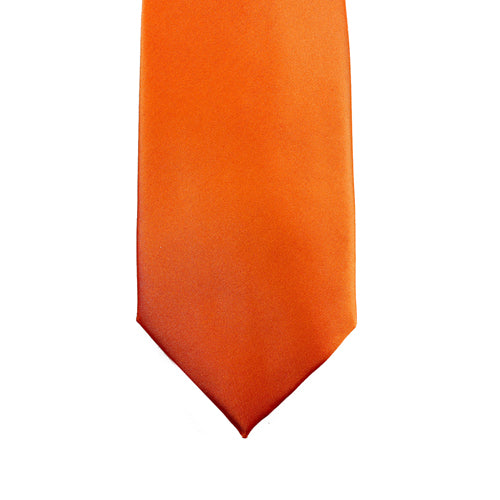 A solid orange microfiber tie. Best paired with a blue dress shirt and brown dress shoes. Great for wedding suits.