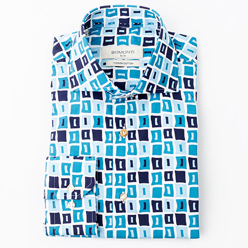 Bomonti sport shirt with navy and teal pattern.